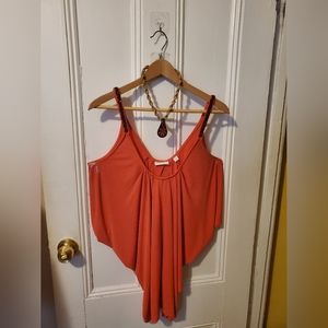 Women slinky flowing beaded shoulder straps top.